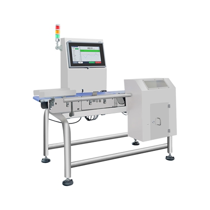 Rugged Dynamic Checkweigher by PC Control Stainless steel dynamic checkweigher with PC control operating in harsh food processing environment